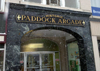 hand carved, with plastic letters and smalts background